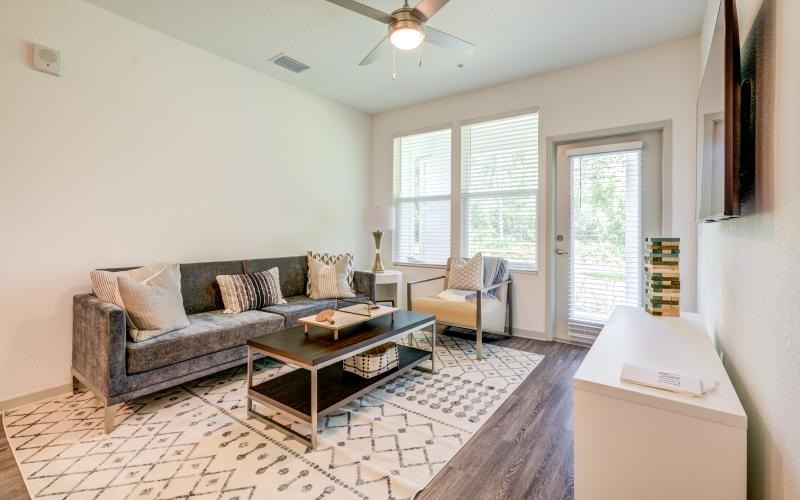 a living room with a couch and a table