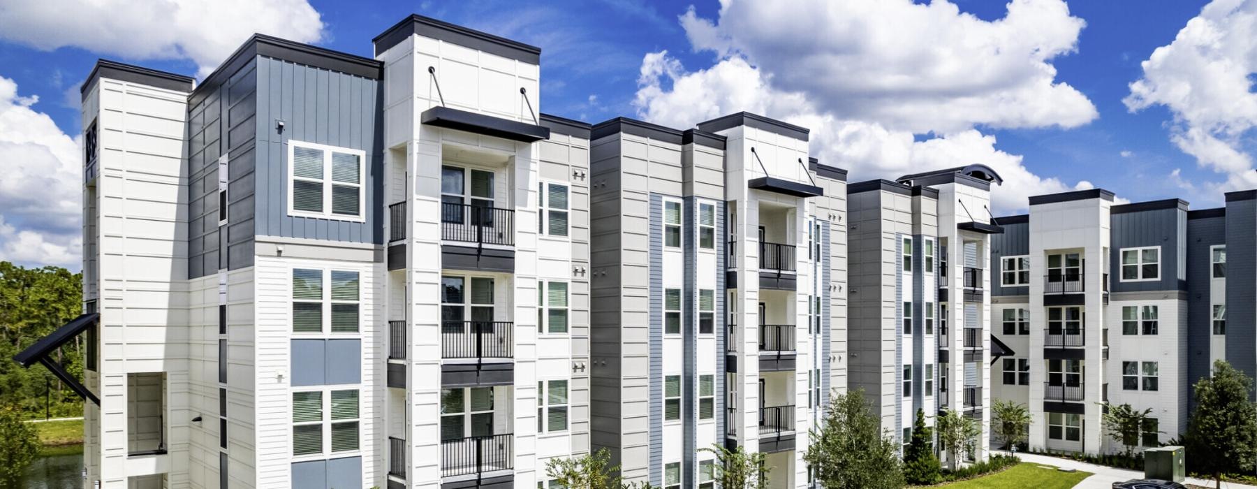 a building with cars parked in front