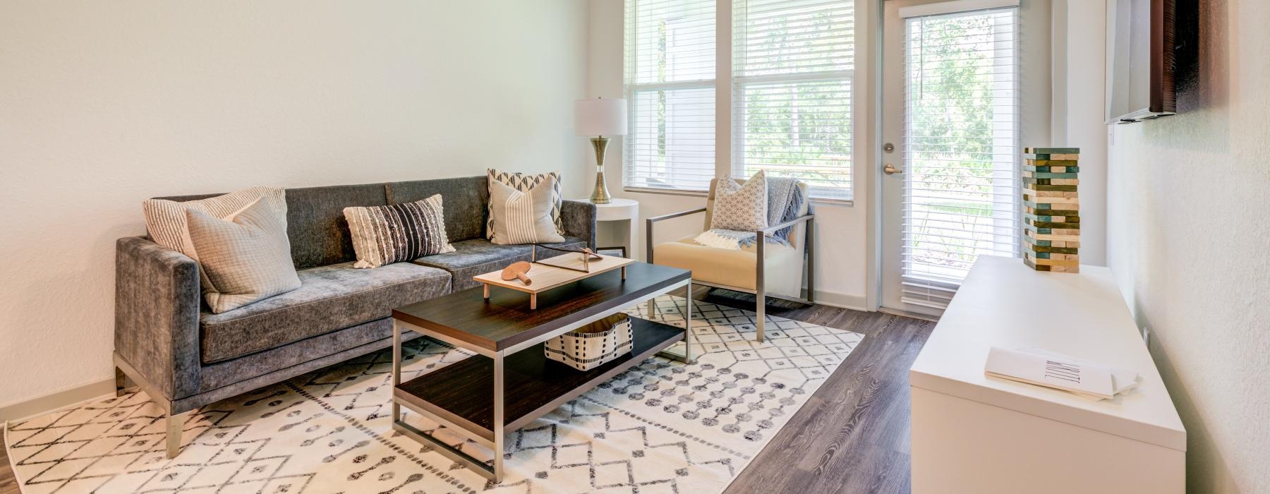 a living room with a couch and a table